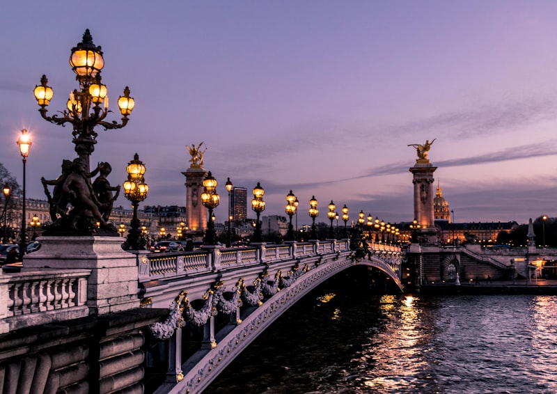 European landmark glowing under a warm summer evening sky